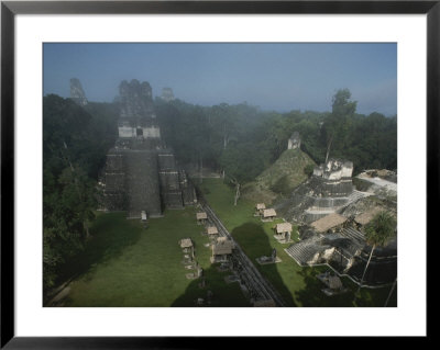 A View Of Mayan Ruins At Tikal by Kenneth Garrett Pricing Limited Edition Print image