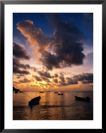 Small Fishing Boats In Water At Sunset, Charlotteville, Trinidad & Tobago by Michael Lawrence Pricing Limited Edition Print image