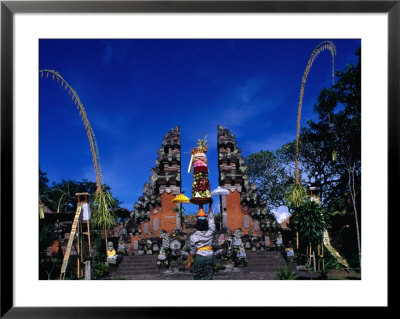 Worshipper Bringing Offering To Pura Pentaran Sasih In Pejang, Bali, Indonesia by Bill Wassman Pricing Limited Edition Print image