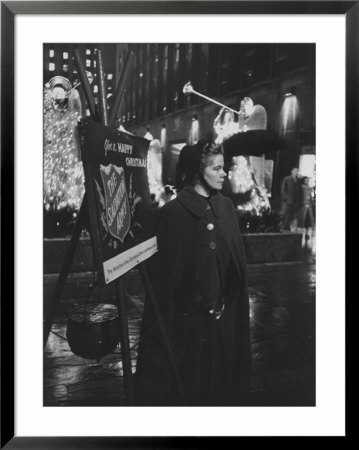 Young Salvation Army Volunteer Soliciting Christmas Time Contributions At Rockefeller Center by Peter Stackpole Pricing Limited Edition Print image