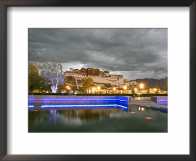 Water Feature In Front Of The Potala Square Lit Up With Neon Blue Lights In Early Evening, China by Don Smith Pricing Limited Edition Print image