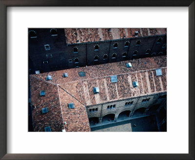 Looking Down On The Courtyards And Tiled Roofs On The Piazza Dei Signori In Verona, Veneto, Italy by Jeffrey Becom Pricing Limited Edition Print image