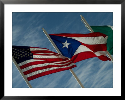 American, Puerto Rican And Italian Flags Waving Against A Blue Sky by Todd Gipstein Pricing Limited Edition Print image