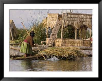 Woman With Boat Full Of Totora Reeds On Floating Islands, Islas De Los Uros, Lake Titicaca, Peru by Dennis Kirkland Pricing Limited Edition Print image