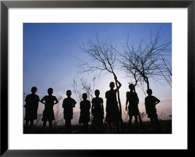 Group Of Village Children Silhouetted In Nsasje District, Southern, Malawi by Jerry Galea Pricing Limited Edition Print image