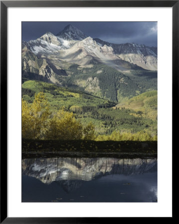 Mount Wilson And The San Juan Mountains Casting Reflections In A Lake by Gordon Wiltsie Pricing Limited Edition Print image