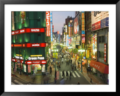 Busy Streets And Neon Signs In The Evening At Shinjuku Station, Shinjuku, Tokyo, Japan, Asia by Chris Kober Pricing Limited Edition Print image