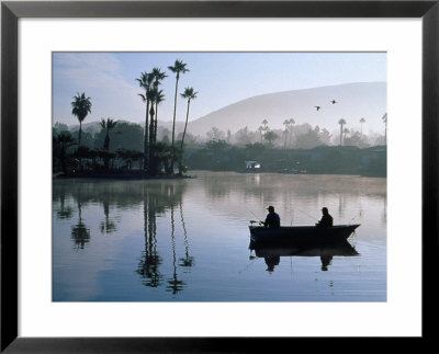 Two People Fishing In Boat At Dawn, Lake San Marcos, California, Usa by Jeff Greenberg Pricing Limited Edition Print image