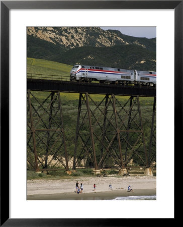 The Coast Starlight Passes Over A Trestle Bridge Near Santa Barbara, California by Phil Schermeister Pricing Limited Edition Print image