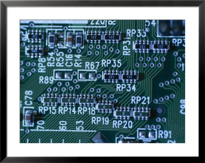 Close View Of Computer Circuitry Board Connections Soldered Together by Taylor S. Kennedy Pricing Limited Edition Print image