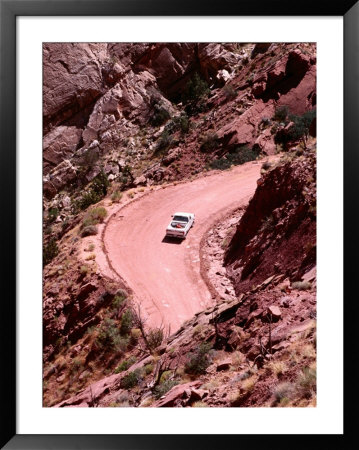Overhead Of Vehicle On Burr Trail Switchback, Waterpocket Fold, Capitol Reef National Park, U.S.A. by Curtis Martin Pricing Limited Edition Print image
