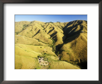 View Showing Zulu Village Or Umuzi And Terrain, Near Eshowe, South Africa by Roger De La Harpe Pricing Limited Edition Print image