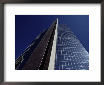 The Desert Sky Reflected In The Soaring Glass Walls Of A 40-Story Building by George F. Mobley Pricing Limited Edition Print image