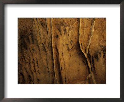 Ancient Negative Handprints On The Walls Of The Handprint Cave by Stephen Alvarez Pricing Limited Edition Print image