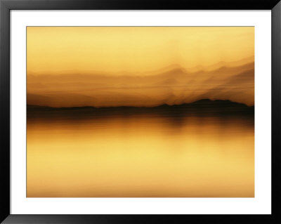 A Blurred View Of Spruce Trees Along The Mackenzie River At Sunset by Raymond Gehman Pricing Limited Edition Print image