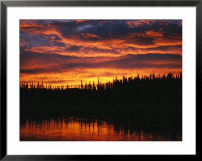 Sunset Is Reflected In The Mackenzie River by Raymond Gehman Pricing Limited Edition Print image