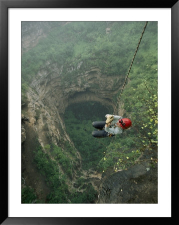 A Biologist Ascends Tawi Attair, A 200-Meter Deep Sinkhole by Stephen Alvarez Pricing Limited Edition Print image