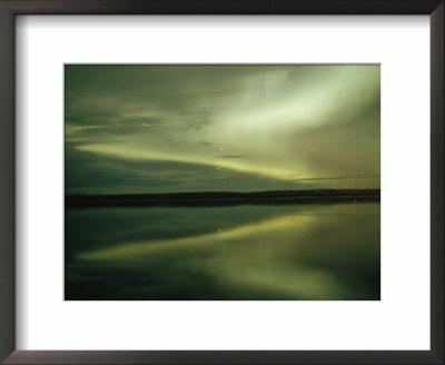 The Aurora Borealis Is Reflected Brightly In The Mackenzie River by Raymond Gehman Pricing Limited Edition Print image