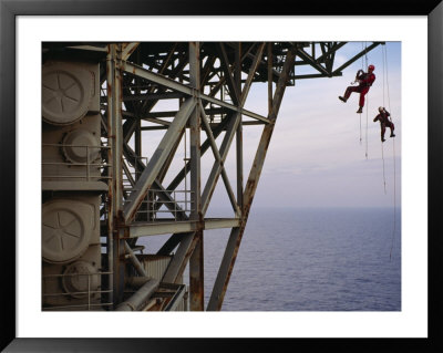 Remote Access Technicians Dangle Off Ropes On An Oil Rig by Eightfish Pricing Limited Edition Print image