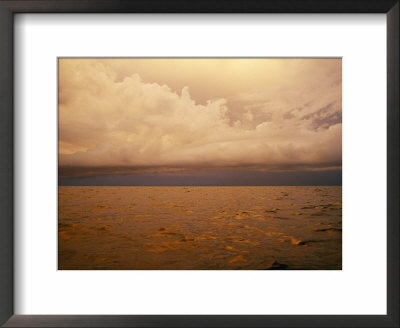 The Caribbean Sea Reflects The Sunset Off Caye Caulker, Belize by Stephen Alvarez Pricing Limited Edition Print image