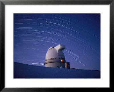 Time-Exposure Of The Mauna Kea Observatory Taken At Night, The Streaks In The Sky Are Star Trails by Robert Madden Pricing Limited Edition Print image