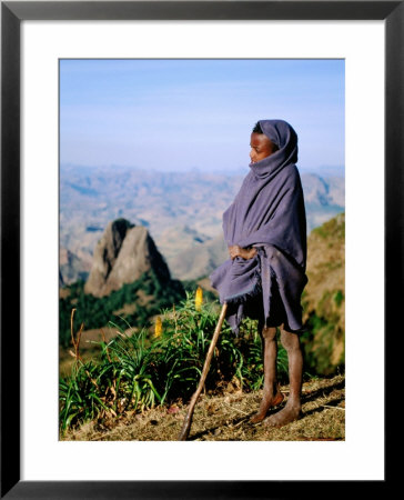 Shepherd Boy With Simien Mountains Background, Simien Mountains National Park, Ethiopia by Frances Linzee Gordon Pricing Limited Edition Print image