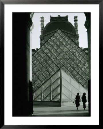 Looking Through An Arched Entrance Of The Musee Du Louvre Towards The Glass Pyramid, Paris, France by Mark Newman Pricing Limited Edition Print image