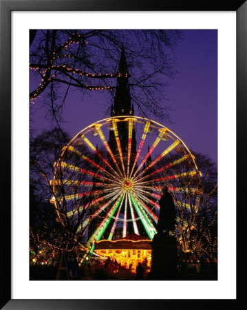 Scott Monument And Christmas Ferris Wheel In Princes Street Gardens, Edinburgh, United Kingdom by Jonathan Smith Pricing Limited Edition Print image