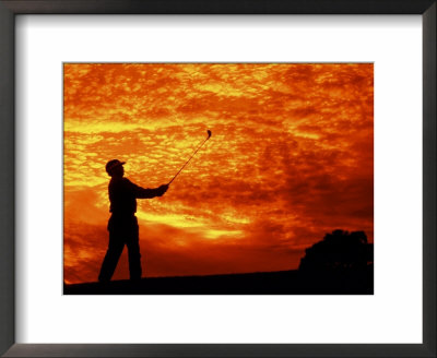 Man Swinging Golf Club At Sunset by Bill Bachmann Pricing Limited Edition Print image
