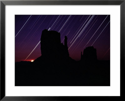 Star Streaks Above The Silhouetted Mitten Buttes by Michael Nichols Pricing Limited Edition Print image