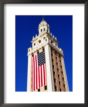 Us Flag Hanging From Building, Miami, U.S.A. by Oliver Strewe Pricing Limited Edition Print image