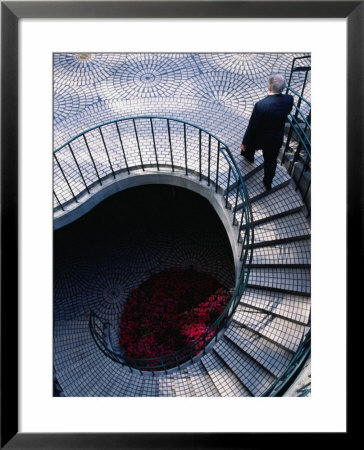 Businessman Ascending Stairs At Embarcadero Centre, San Francisco, California, Usa by Roberto Gerometta Pricing Limited Edition Print image
