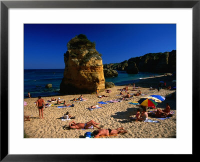 Sunbathers On Beach, Lagos, Portugal by Anders Blomqvist Pricing Limited Edition Print image