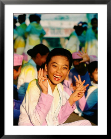 Portrait Of Smiling Teenage Girl, Thailand by Alain Evrard Pricing Limited Edition Print image