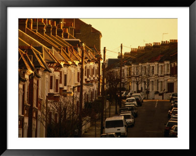 Rows Of Identical Houses Lining Street In Clapham, London, England by Jon Davison Pricing Limited Edition Print image