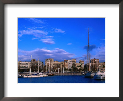 Boats Moored In Harbour With Buildings Behind, Barcelona, Spain by Anders Blomqvist Pricing Limited Edition Print image