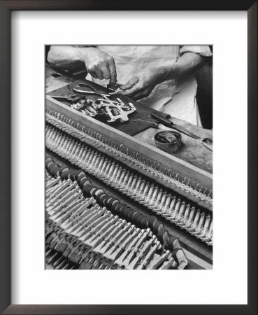 Workman Installing Some Of The Whippens, Shanks And Hammers At The Steinway Piano Factory by Margaret Bourke-White Pricing Limited Edition Print image