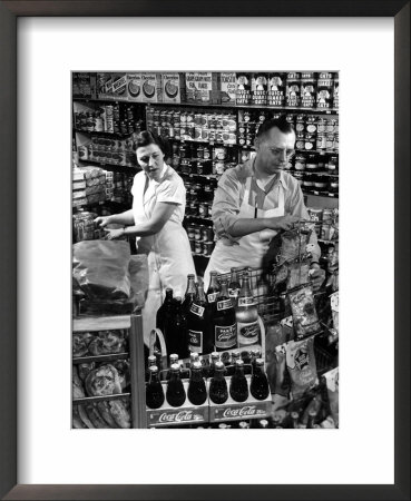 Stan Wentland And Wife Jo Restock Grocery Store, Rockford, Illinois by Margaret Bourke-White Pricing Limited Edition Print image
