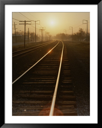 Morning Sun Shines On Railroad Tracks by Stephen St. John Pricing Limited Edition Print image