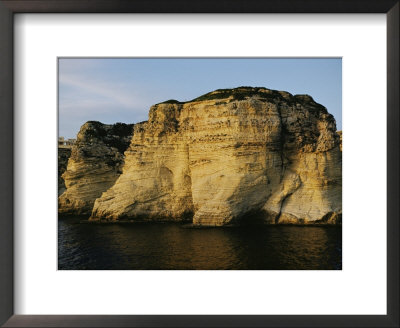 The Pigeons Grottoes Are A Group Of Isolated Rocks That Sit Just Off The Coast Of Beirut by Maynard Owen Williams Pricing Limited Edition Print image