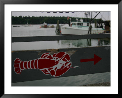A Lobster Sign Backed By A Lobster Boat On Casco Bay by Stephen St. John Pricing Limited Edition Print image