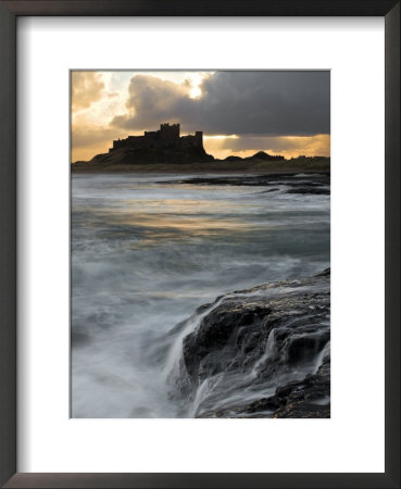 View Of Bamburgh Castle At Sunset, Uk by David Clapp Pricing Limited Edition Print image