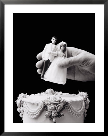 Female Hand Holding Wedding Cake Topper by Howard Sokol Pricing Limited Edition Print image