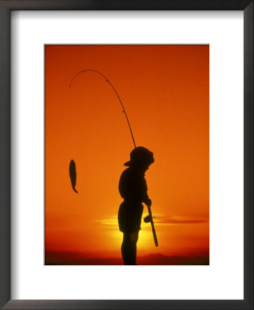 Silhouette Of Boy Fishing At Sunset by Dean Berry Pricing Limited Edition Print image