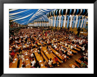 Overhead Of Oktoberfest Drinking Session In Theresienwiede Fairgrounds Beer Tent, Munich, Germany by Krzysztof Dydynski Pricing Limited Edition Print image