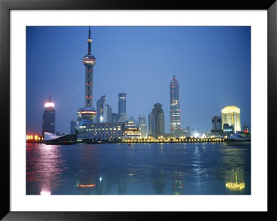 The Shanghai Skyline And Riverfront At Night by Raul Touzon Pricing Limited Edition Print image