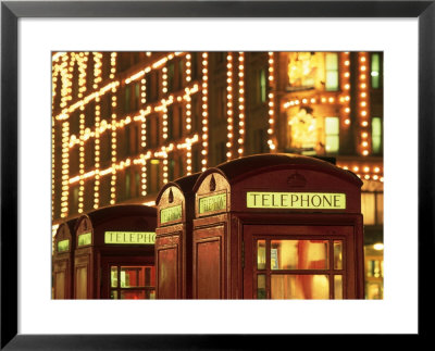 Telephone Booths In Front Store, London, England by Walter Bibikow Pricing Limited Edition Print image