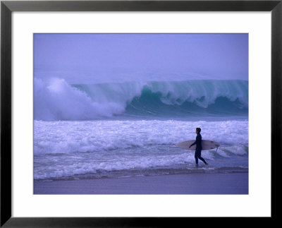 Surfer Entering Shorebreak At Hossegor Near Biarritz, Biarritz, Aquitaine, France by Gareth Mccormack Pricing Limited Edition Print image