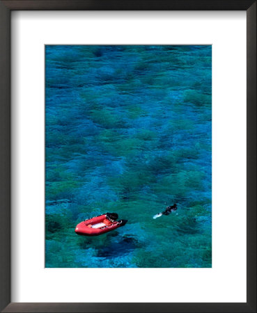 Spearfisher And His Boat, New Caledonia by Jean-Bernard Carillet Pricing Limited Edition Print image