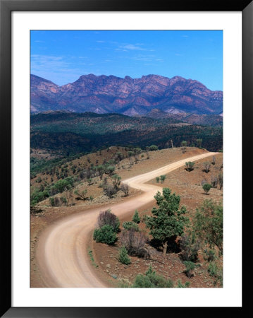 Dirt Road Winding Through Range, Flinders Ranges National Park, Australia by Christopher Groenhout Pricing Limited Edition Print image